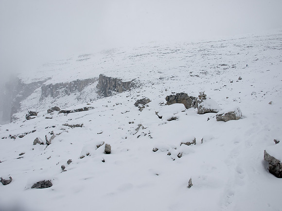 Descending a snowy mountain.