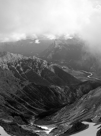 Rundle Mountain is hidden in clouds.