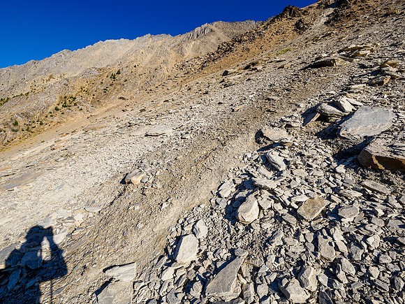 Once the SW slope transitioned to scree and rubble I traversed back to climber's left on easy terrain