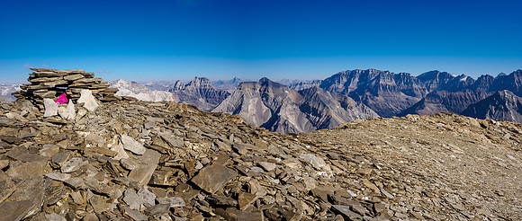 Views past the summit cairn to Lake O'Hara peaks.