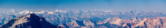 Distant views to the Selkirks and Sir Donald (R) over the Van Horne Range.