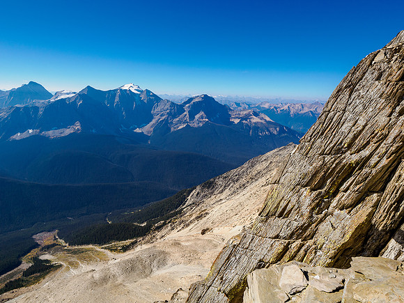 Views off the SSE ridge all the way down the SW face to the avalanche paths far below at left.