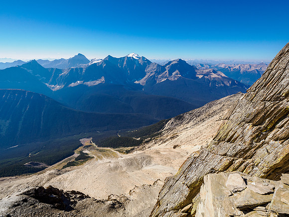 Views off the SSE ridge all the way down the SW face to the avalanche paths far below at left.