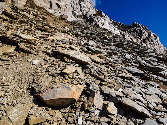 Views back up to the traverse and escape route from the SW face.
