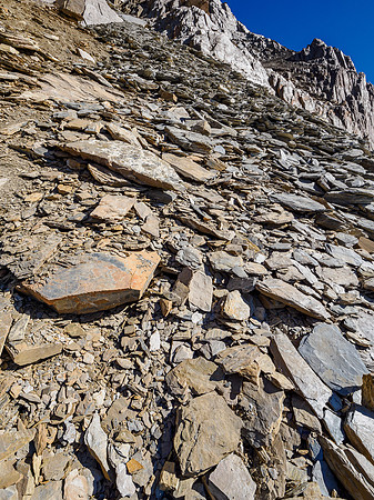 Views back up to the traverse and escape route from the SW face.