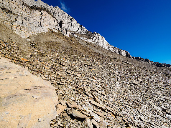 Views back up to the traverse and escape route from the SW face.