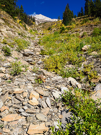 Views back up the gully on the SW face. You can see the summit cliffs from down here already.