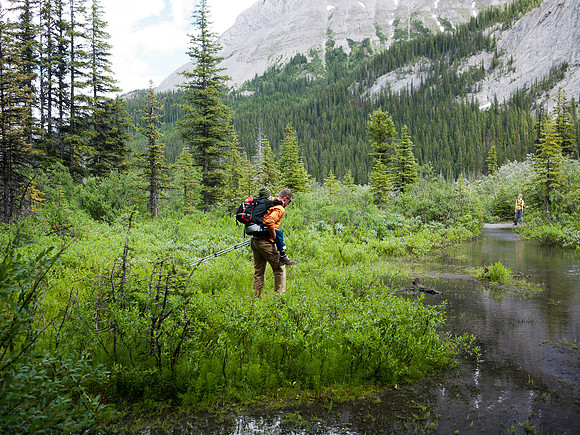 Vern carries Niko across the wet area just after descending back to the flats.