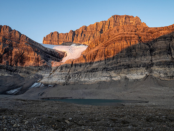 Sunrise on the east face of Cataract Peak from upper Roaring Creek.