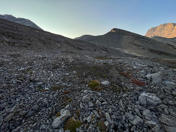 Hiking out of the upper SW corner of Roaring Creek to the McConnell Creek high col.