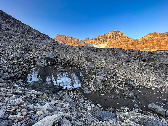 Sunrise on the east face of Cataract Peak from upper Roaring Creek.
