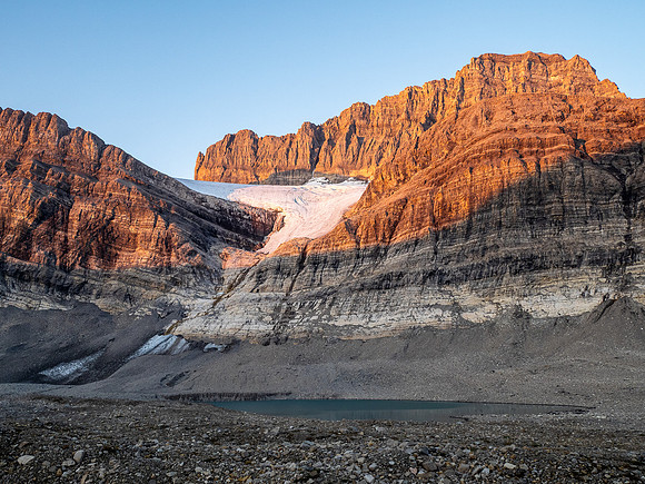 Sunrise on the east face of Cataract Peak from upper Roaring Creek.