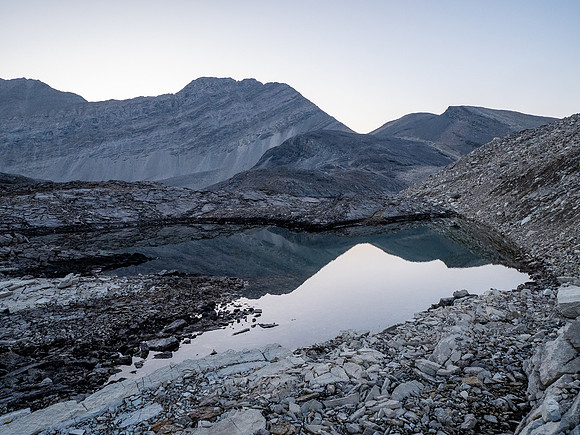 Hiking out of the upper SW corner of Roaring Creek to the McConnell Creek high col.
