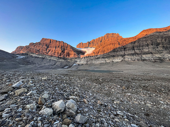 Sunrise on the east face of Cataract Peak from upper Roaring Creek.