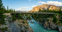 The Red Deer River flows under an old bridge along the Cascade fire road. Mount White in the bg.