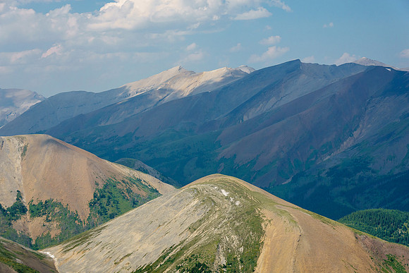 Tomahawk Peak is in shadow just right of the sunlit peak.