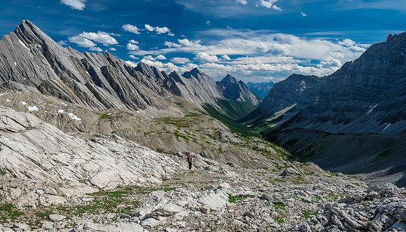 Traversing karst and alpine meadows above the creek bed.