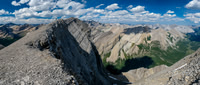 The summit ridge with the exposed east face down to the Cascade River at right.