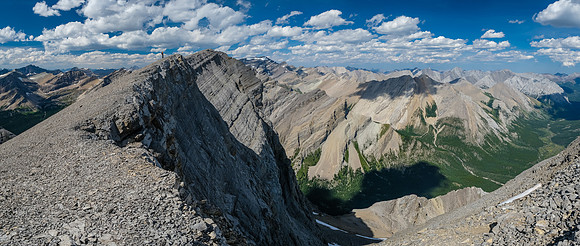 The summit ridge with the exposed east face down to the Cascade River at right.