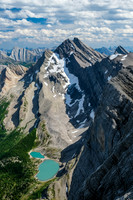 Noetic Peak with its north face glacier towers over two of the Block Lakes.