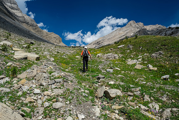 Finally the upper col appears at the head of the approach valley.