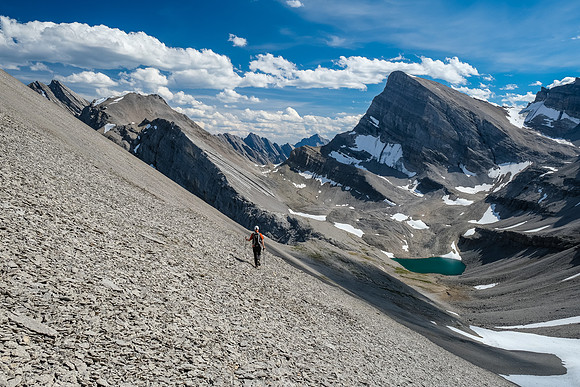 Traversing the west face towards the distant col on Block Mountain.