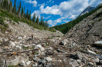 Hiking up the access creek. A mix of forest, bushwhacking, deadfall and wet feet.
