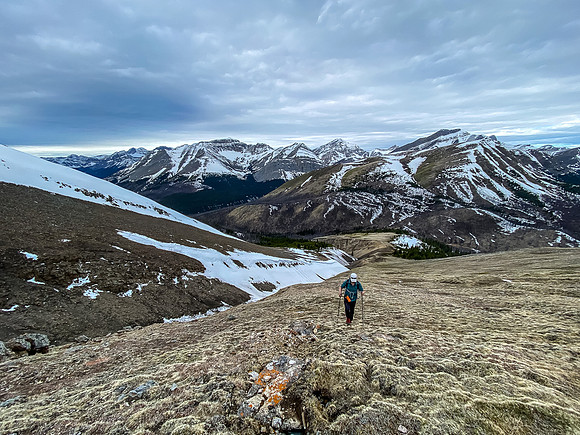 Phil ascends easy west slopes of Sentry Peak. Malloch and Caterpillar Peak in the bg.