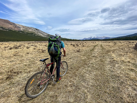 Biking across Harrison Flats.