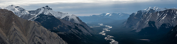 Lost Guide, Scalp, and Forbidden Peak rise over the Clearwater River.