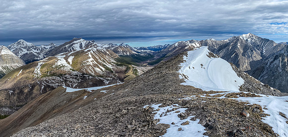 Mamen (L), Caterpillar and Wampum Peak rise over Indianhead Pass (C).