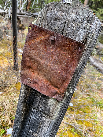 This old sign was near the cairn - not legible.