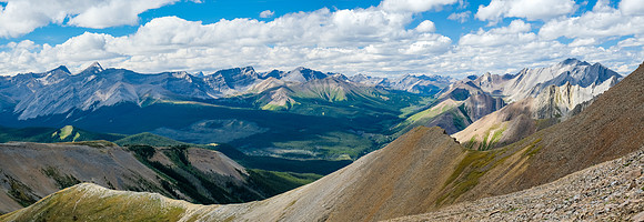 Incredible views north over the Panther River valley up Snow Creek and past Melanin Peak (R).