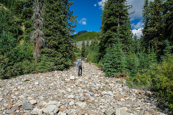The creek becomes the trail. This is inevitable with less maintenance.