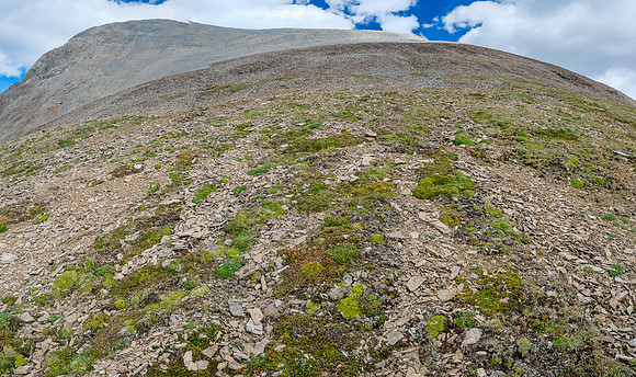 Easy slopes to the first summit.