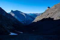 Views back down the gully across the Cascade River valley below. The peak at left is unnamed.