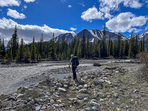 Hiking the Clearwater Trail from Indianhead Lodge to Malloch Meadows. At Malloch Creek.