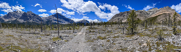 Biking the Clearwater Trail under Lost Guide Peak.