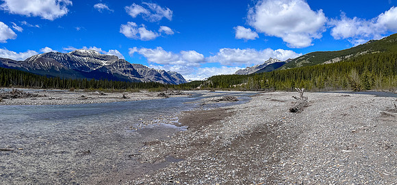 Biking the river flats along the Clearwater Trail.