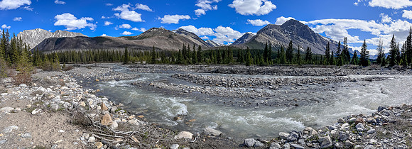 Hiking the Clearwater Trail from Indianhead Lodge to Malloch Meadows. At Malloch Creek.