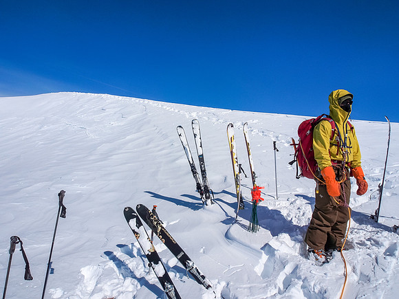 At the ski drop just under the main summit.