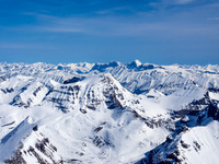 Mounts Warren and Brazeau in the far distance with Little Alberta in the lower left foreground and Woolley and Diadem at center.