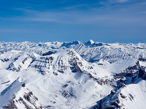 Mounts Warren and Brazeau in the far distance with Little Alberta in the lower left foreground and Woolley and Diadem at center.