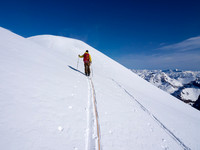 Getting higher on the south ridge. You can just make out the other ascent party near the summit ridge.