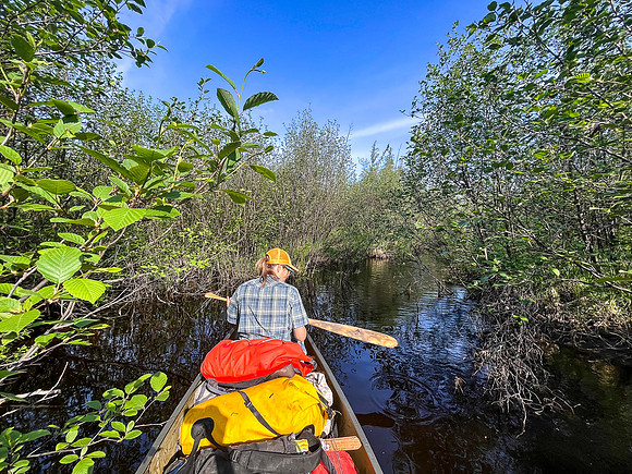 Traveling a small stream out of North Prairie towards Joey Lake.