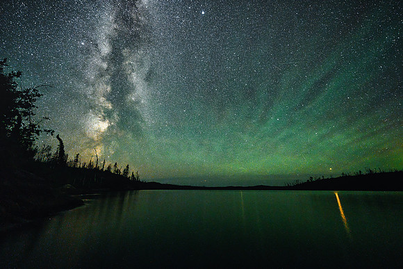 The Milky Way (L) and Mars (R) reflecting in Colin Lake.