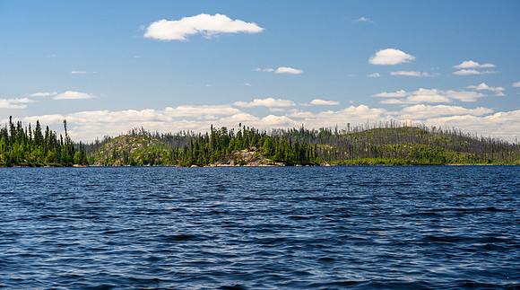 Paddling Colin Lake around the north end of Sandomirsky Island.