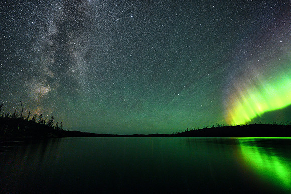 Aurora borealis (northern lights) and the Milky Way over Colin Lake.