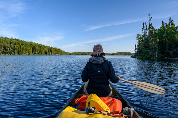 Paddling a calm Minuhik Lake.