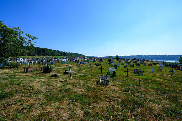 Touring the cemetery at the Stanley Mission church grounds.
